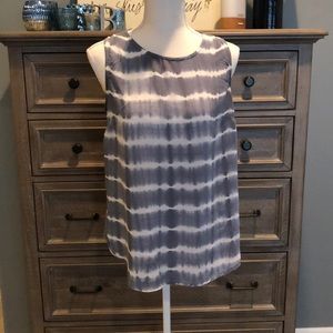 Blue and white sleeveless top